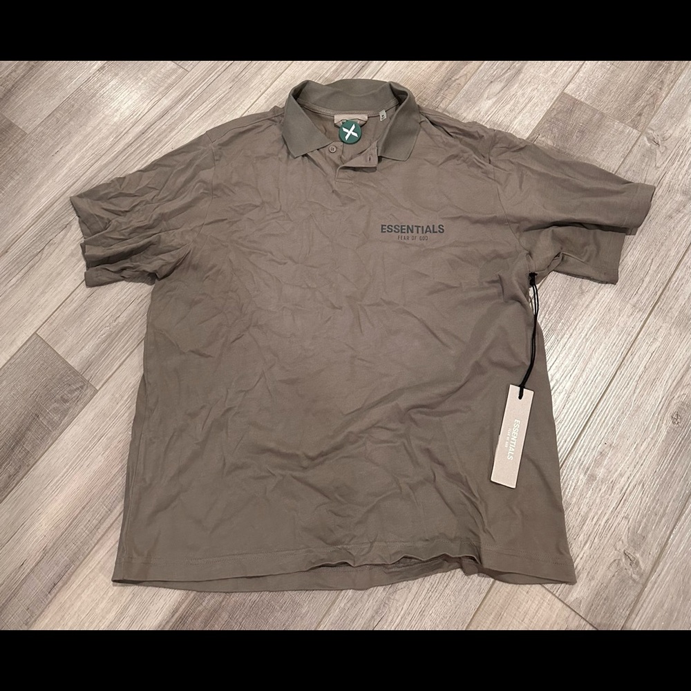 brand new Essentials polo size medium
